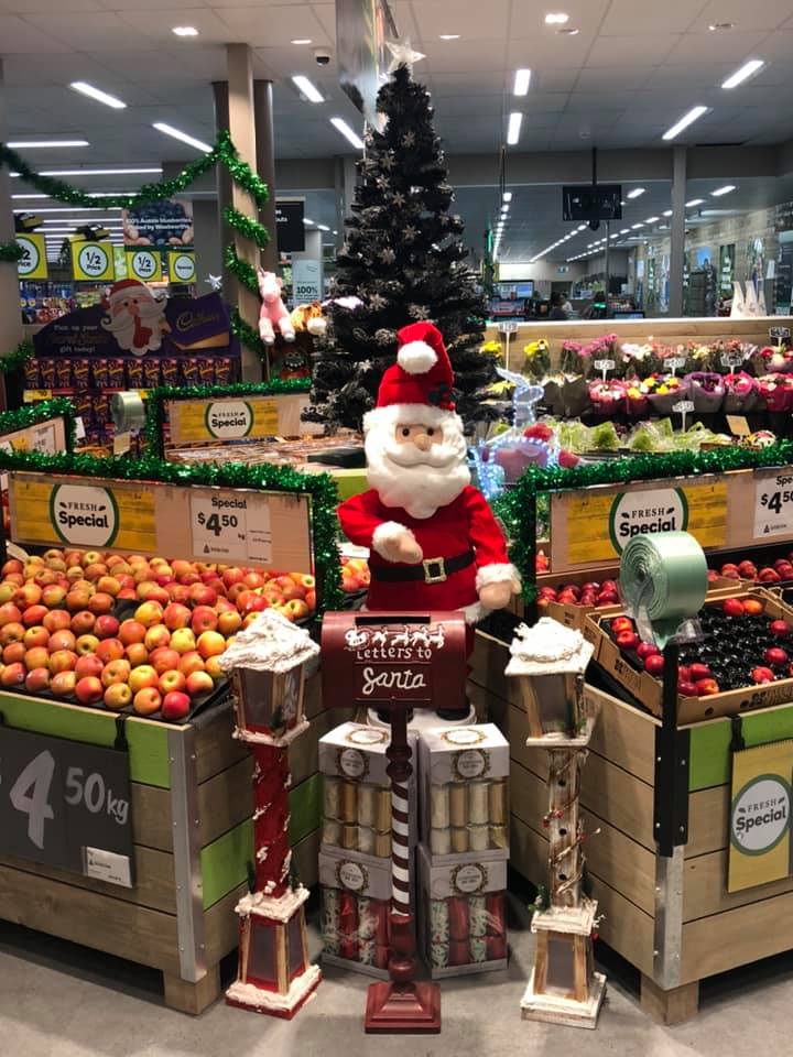 fruit stand with santa