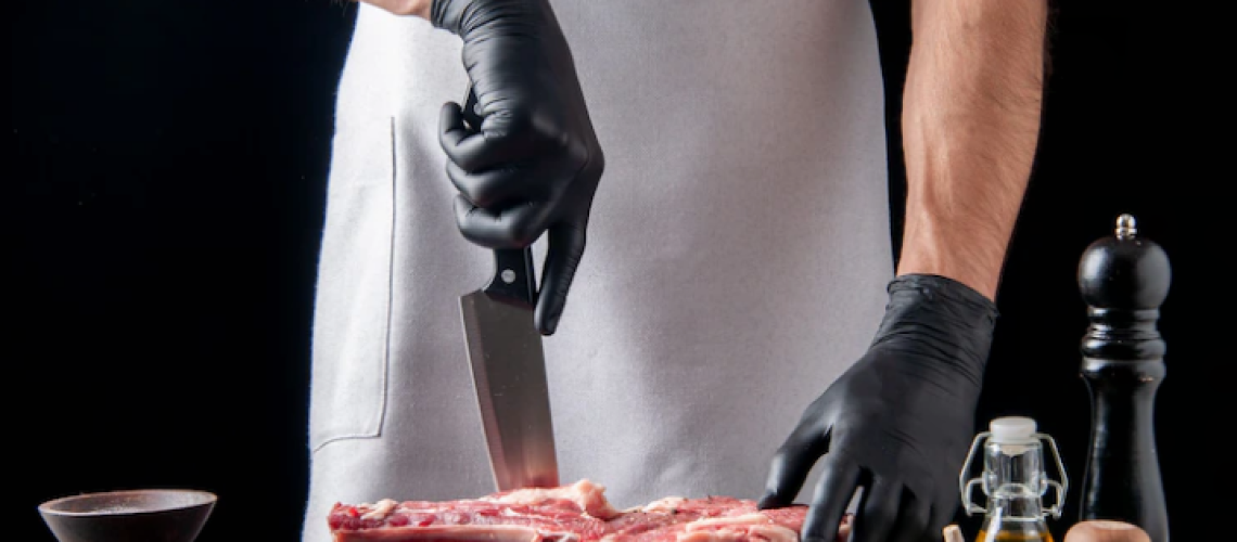 chef slicing pork